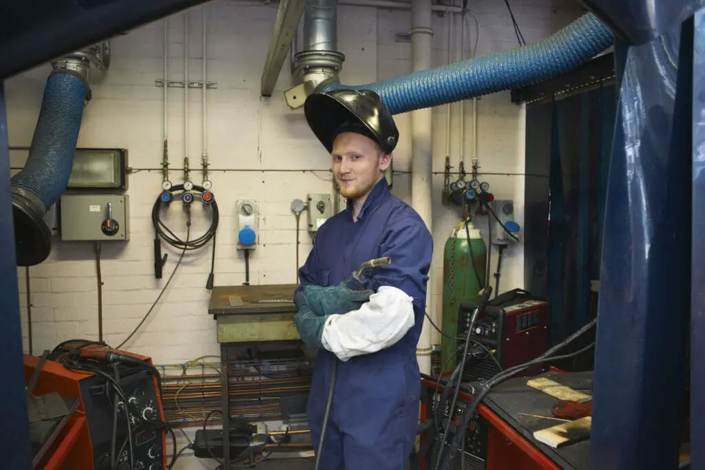 Portrait of male student welder